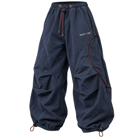 Indigo Orbit Cord Parachute Pant by Night Yard on transparent background